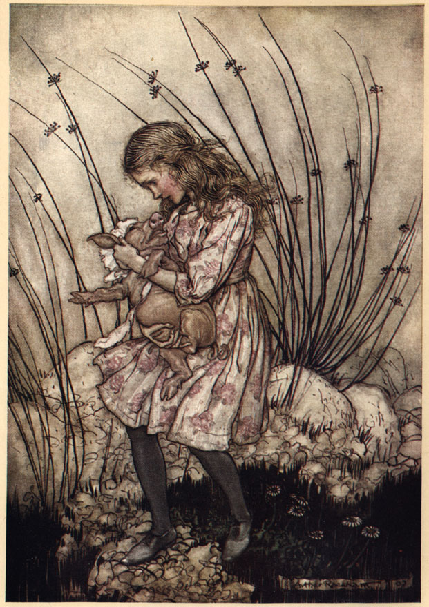 Alice holding a pig boy