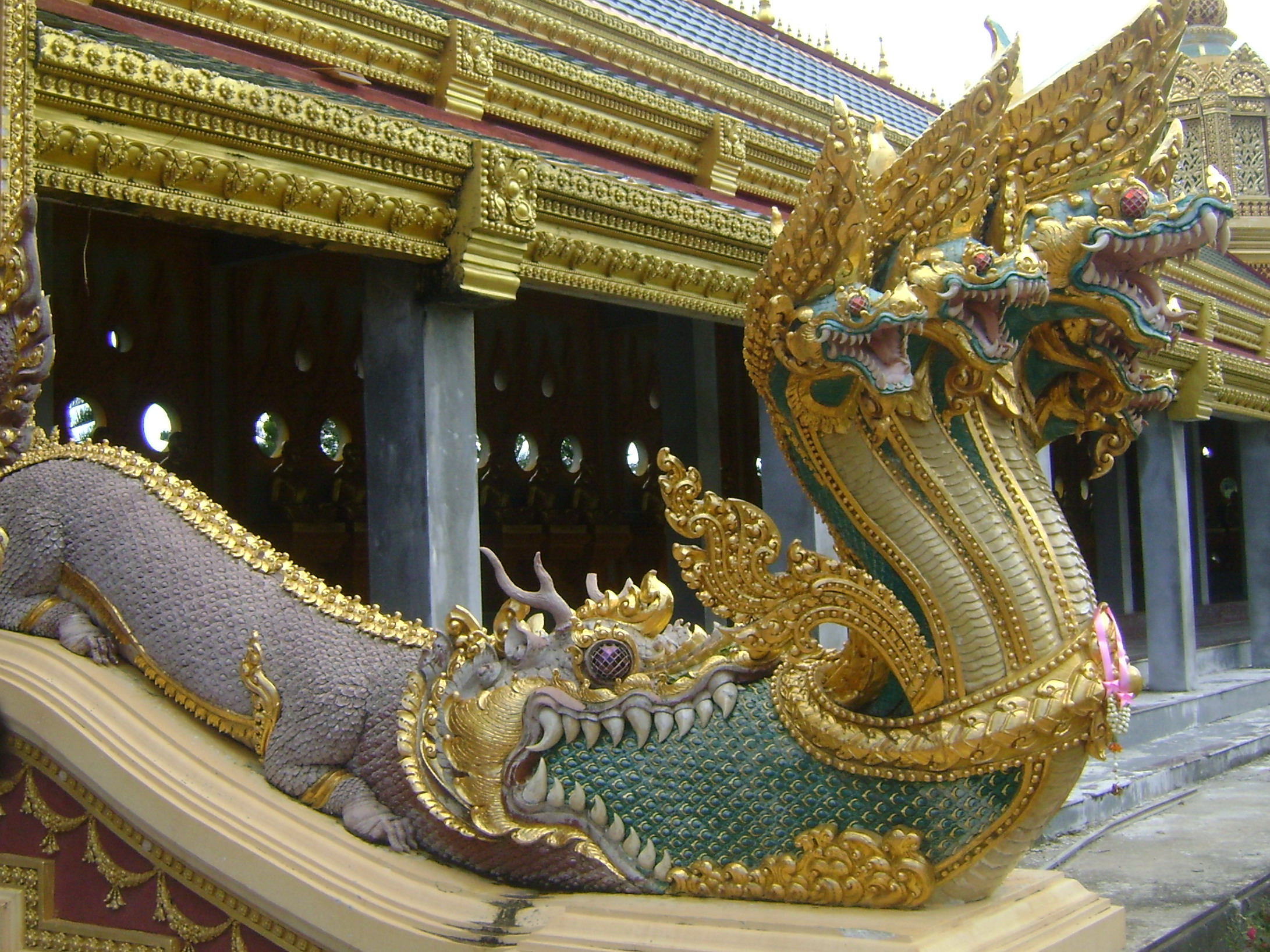 Phra Maha Chedi Chai Mongkol Naga emerging from mouth of Makara